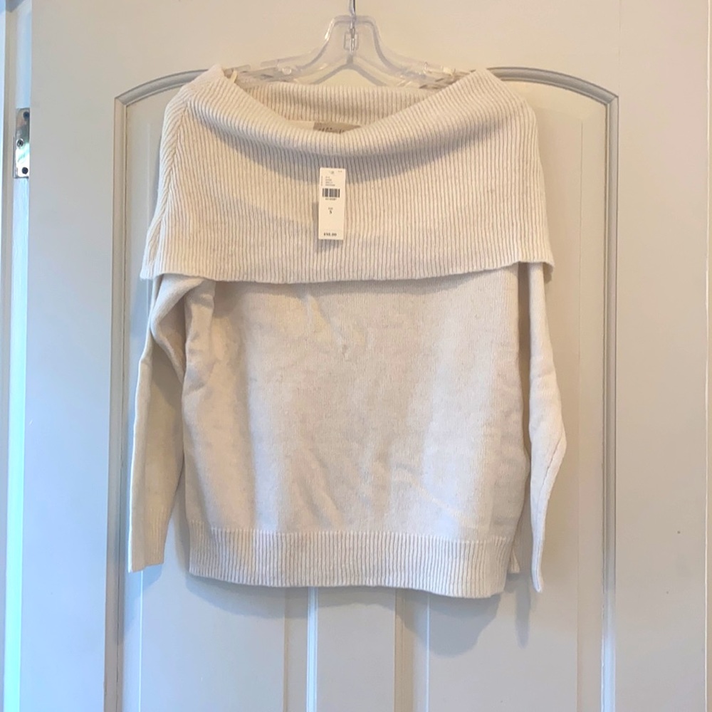 Cream off the shoulder sweater.